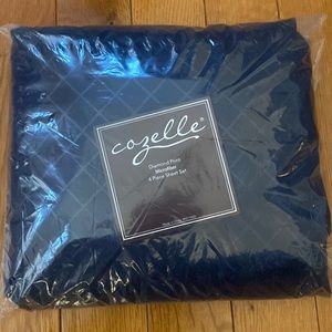 Brand new Queen microfiber navy blue 4 piece sheet set